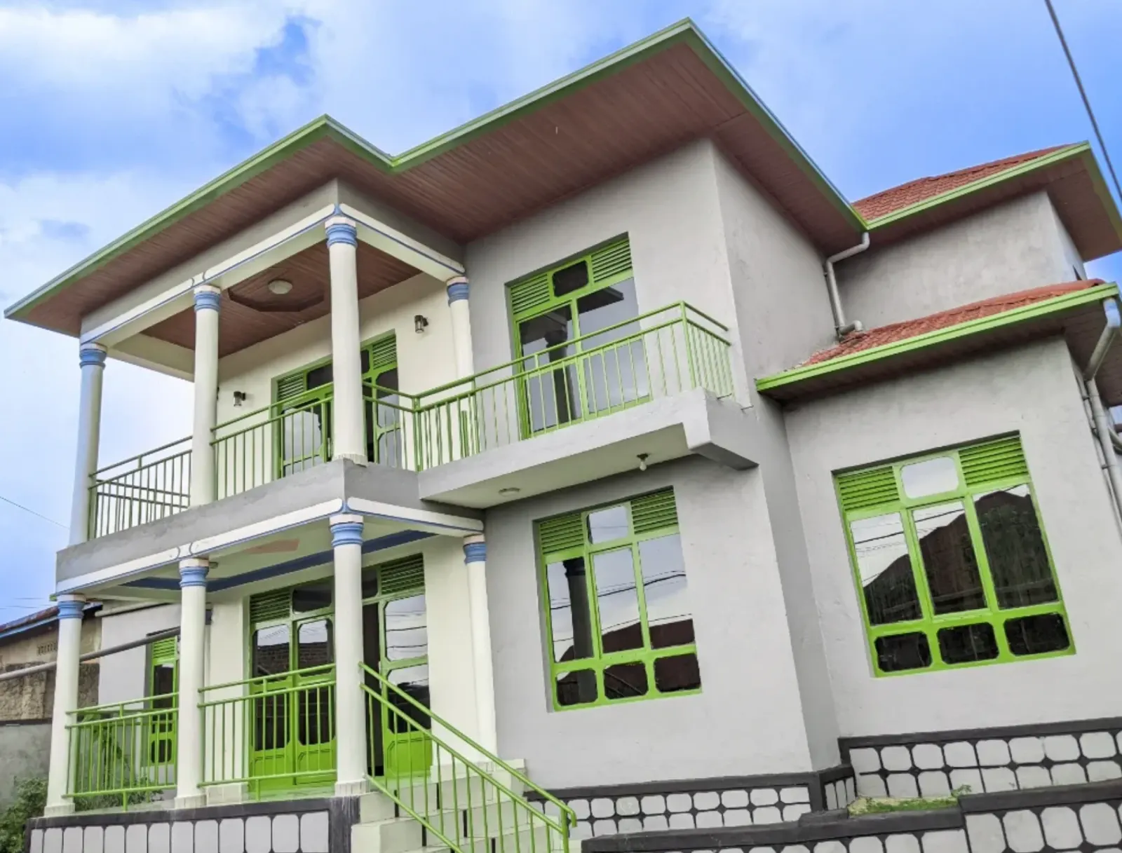 The house, with balconies on both floors