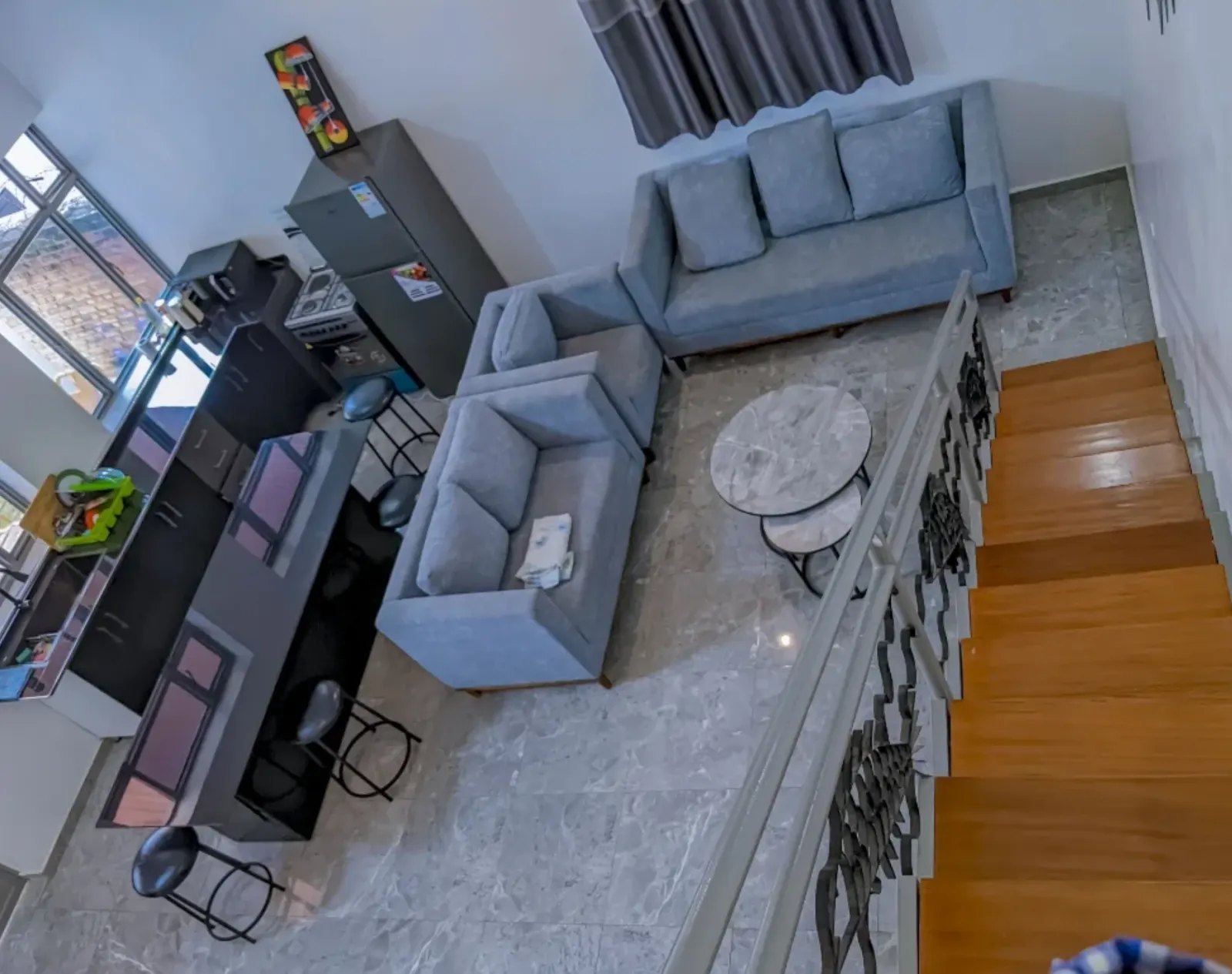 Living room and kitchen, from the landing above