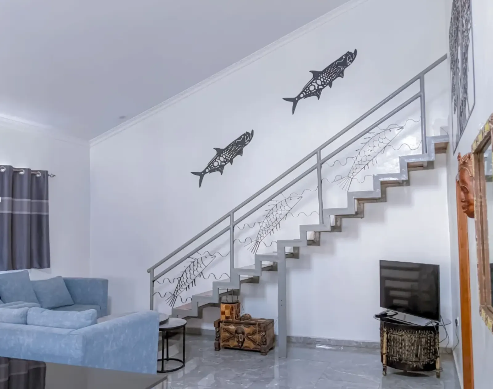 The staircase and the fish along the wall