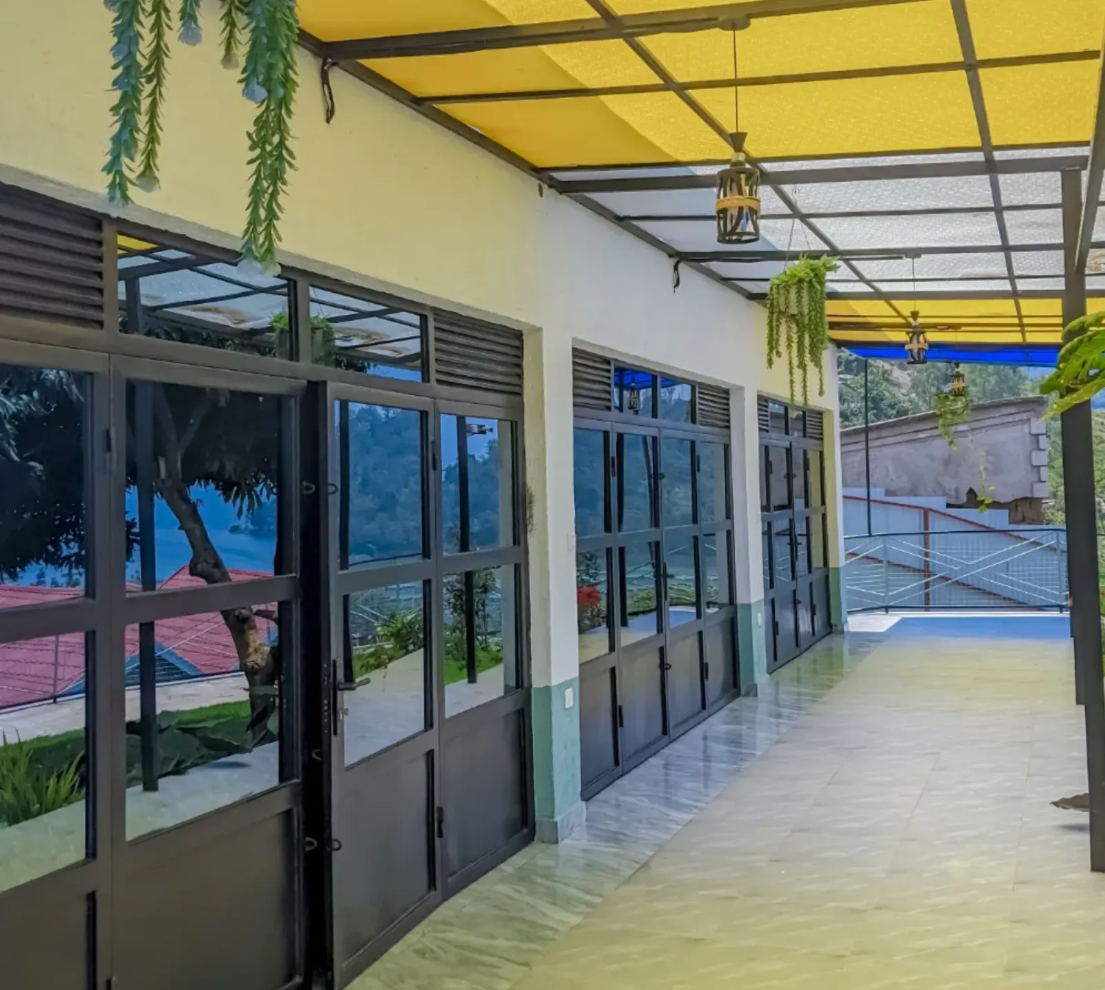 The covered terrace under its awning, facing the lake
